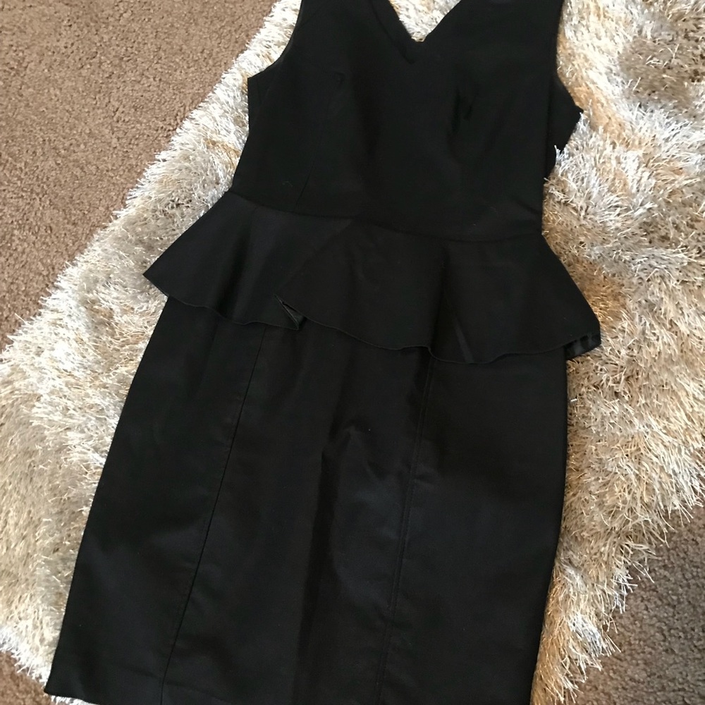 Black Peplum Dress with Gold Zipper down the back!